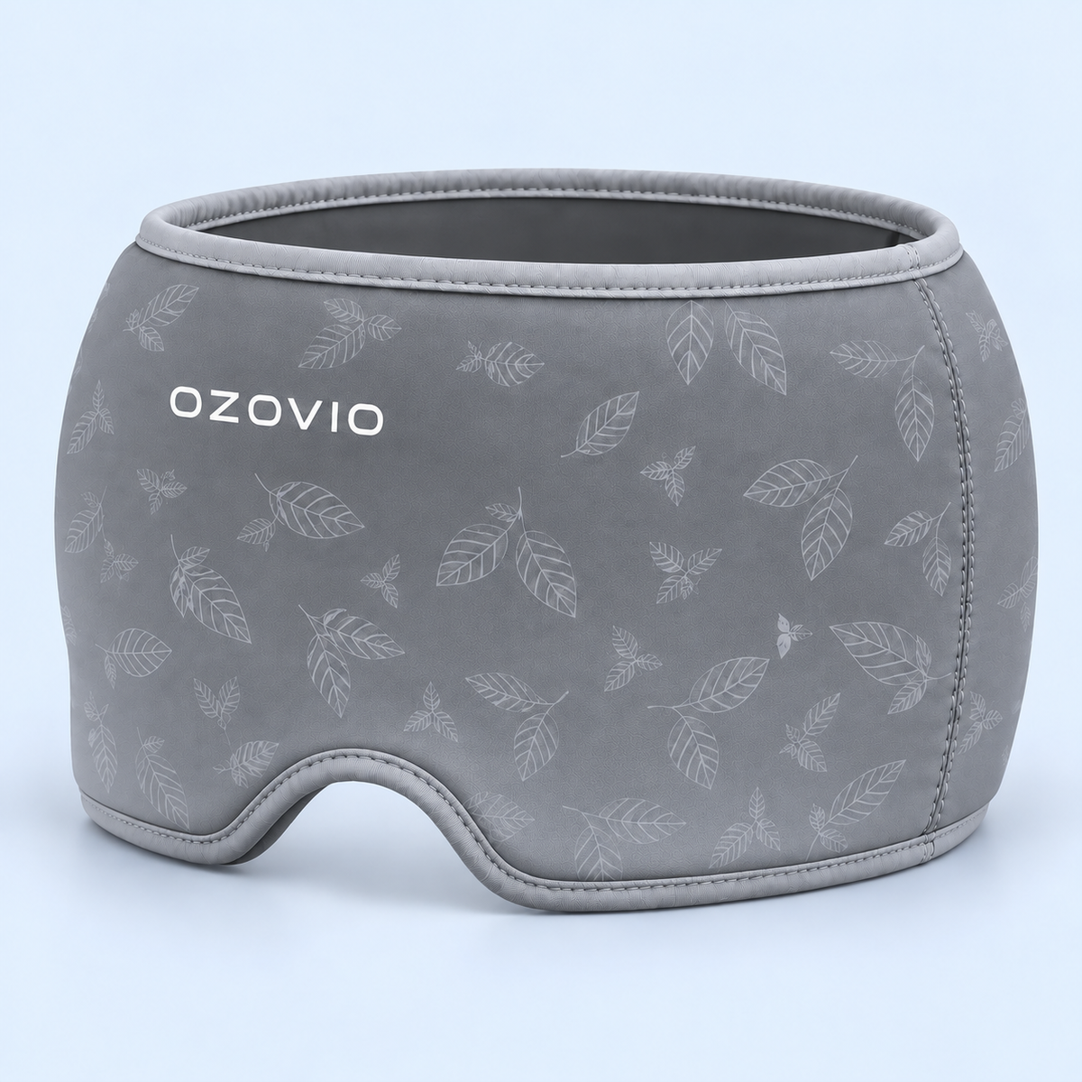Máscara antimigraña OZOVIO en color gris, con el estampado de hojas en relieve