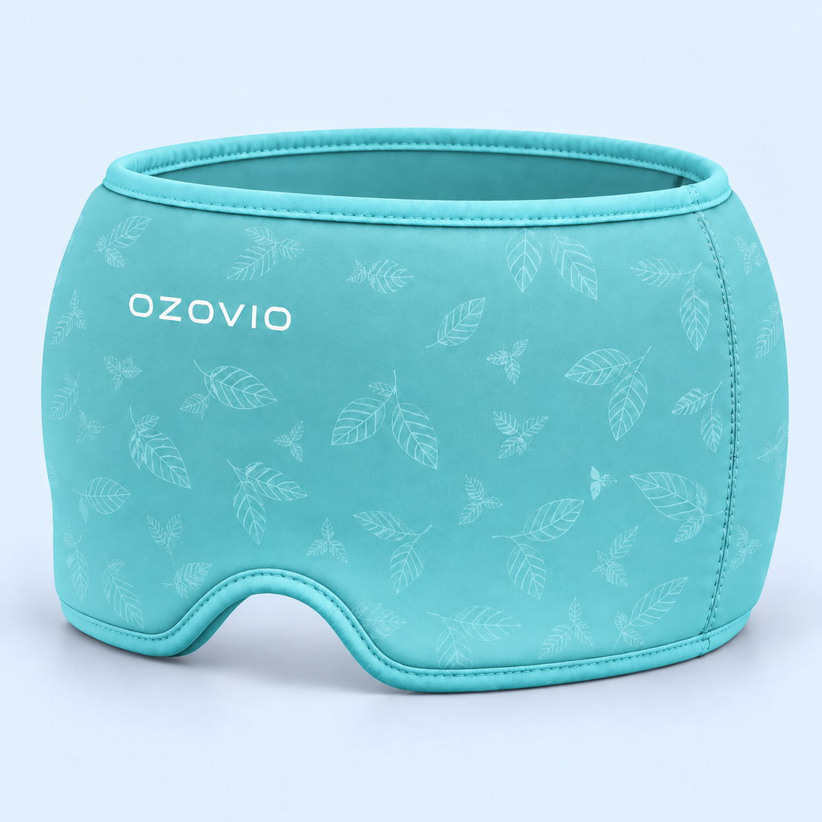 Máscara antimigraña OZOVIO en color turquesa, con el estampado de hojas en relieve