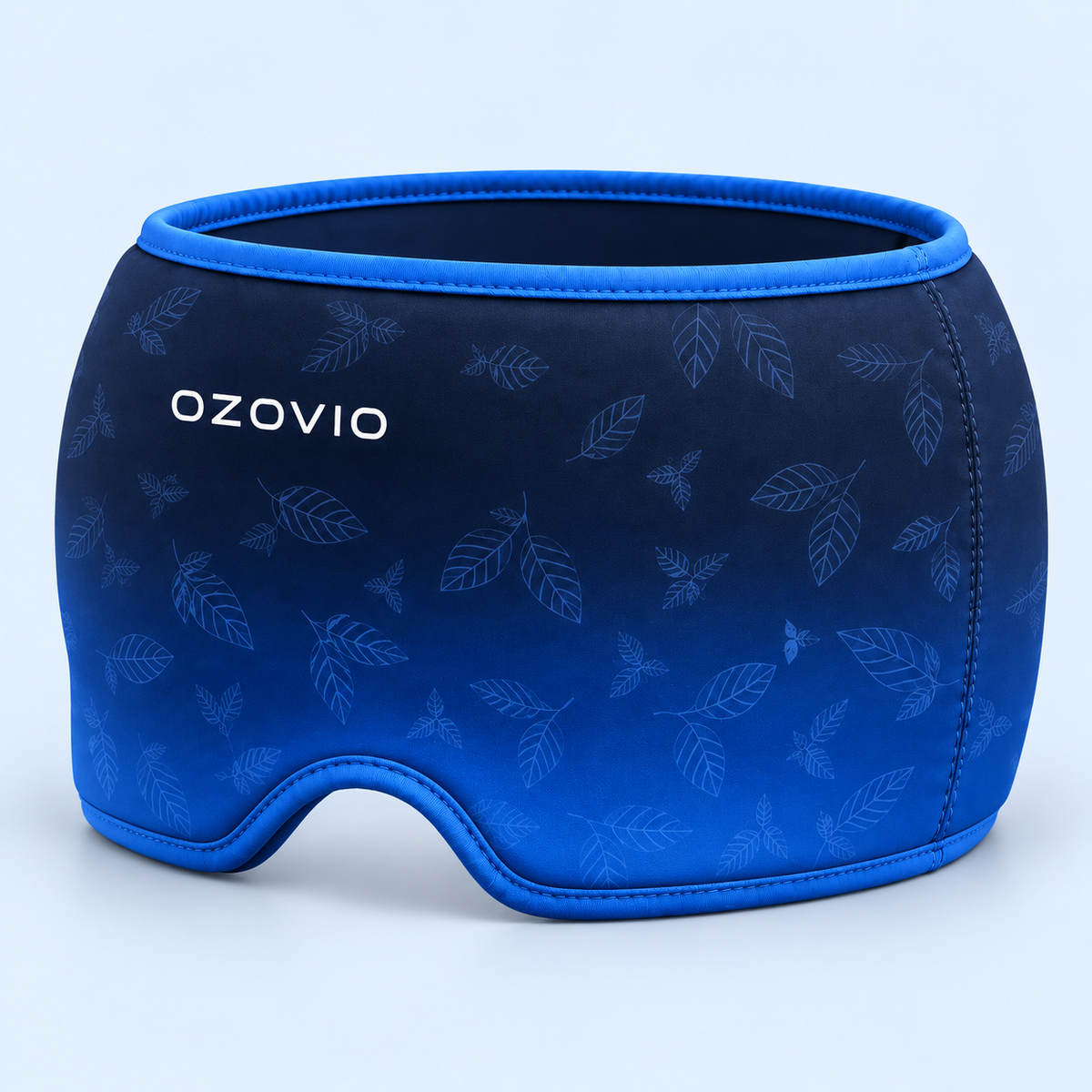 Máscara antimigraña OZOVIO en color azul, con el estampado de hojas en relieve